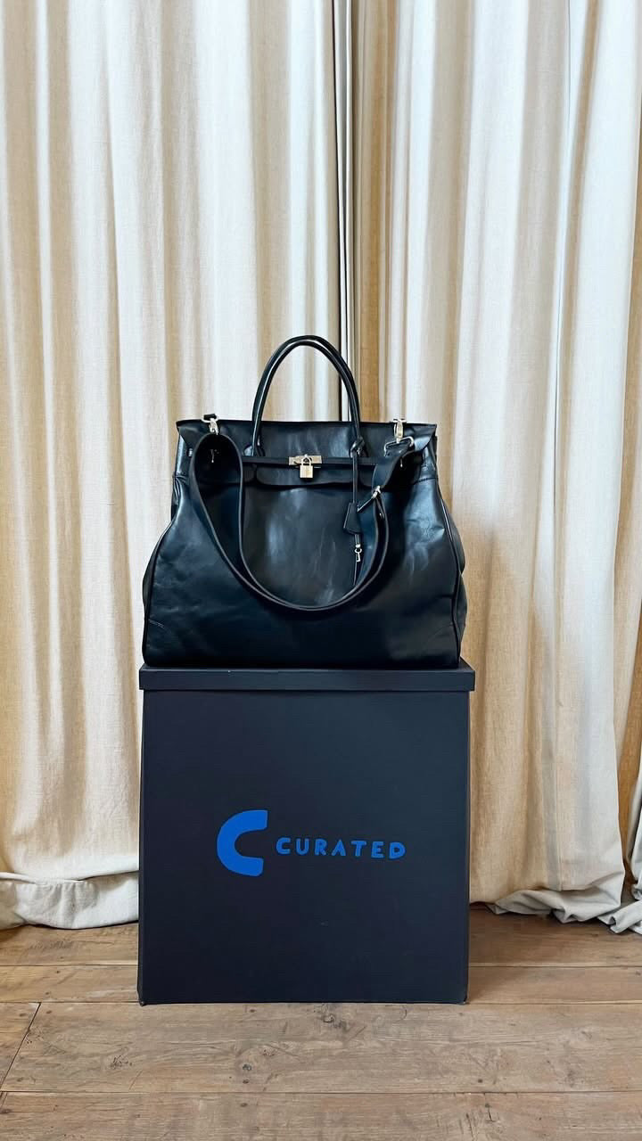 Black full leather weekender + strap + silver hardware