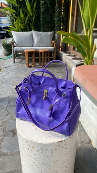 Purple mini weekender with strap brass hardware