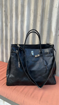 Black full leather weekender + strap + silver hardware