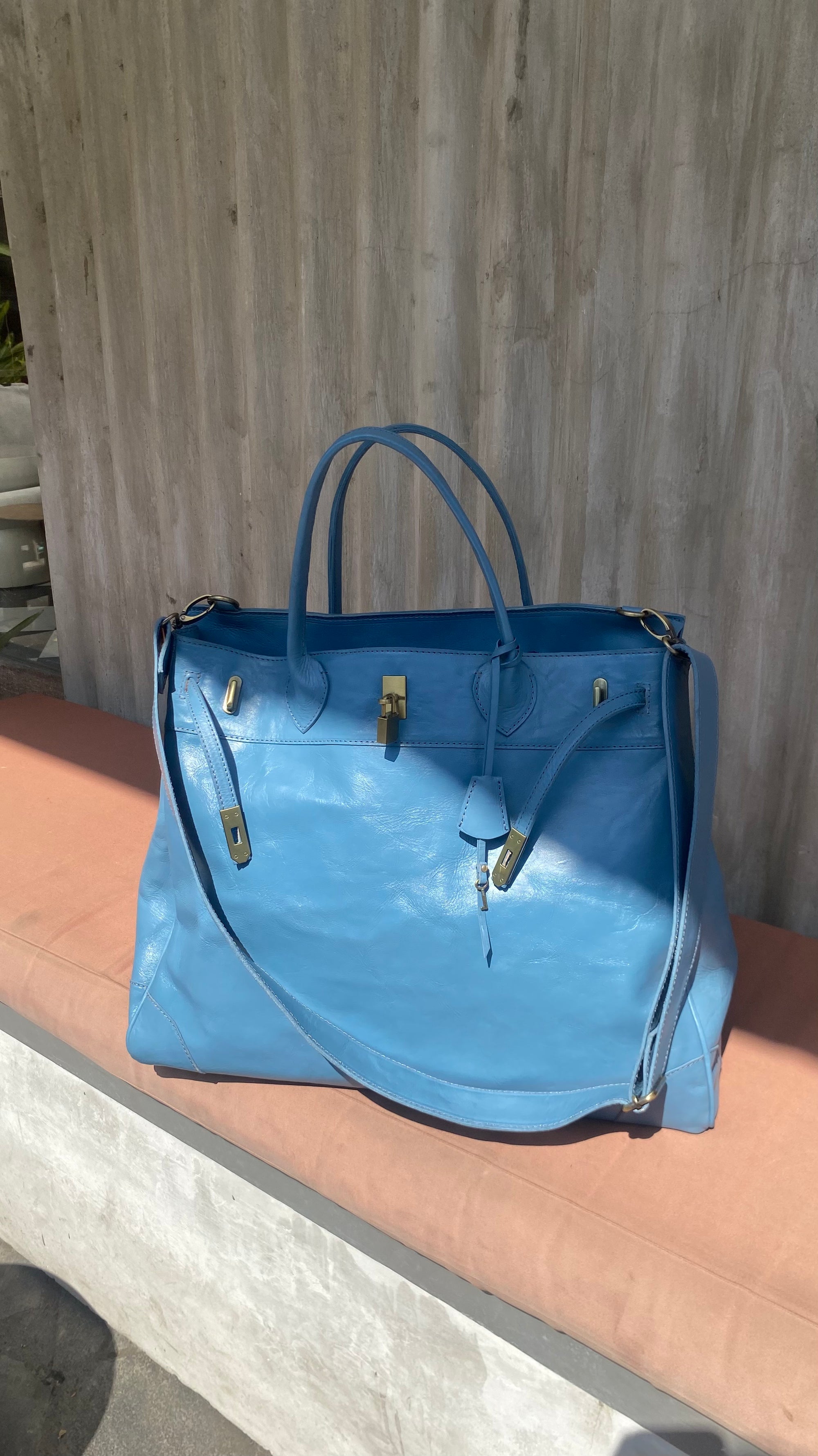 Blue full leather weekender strap