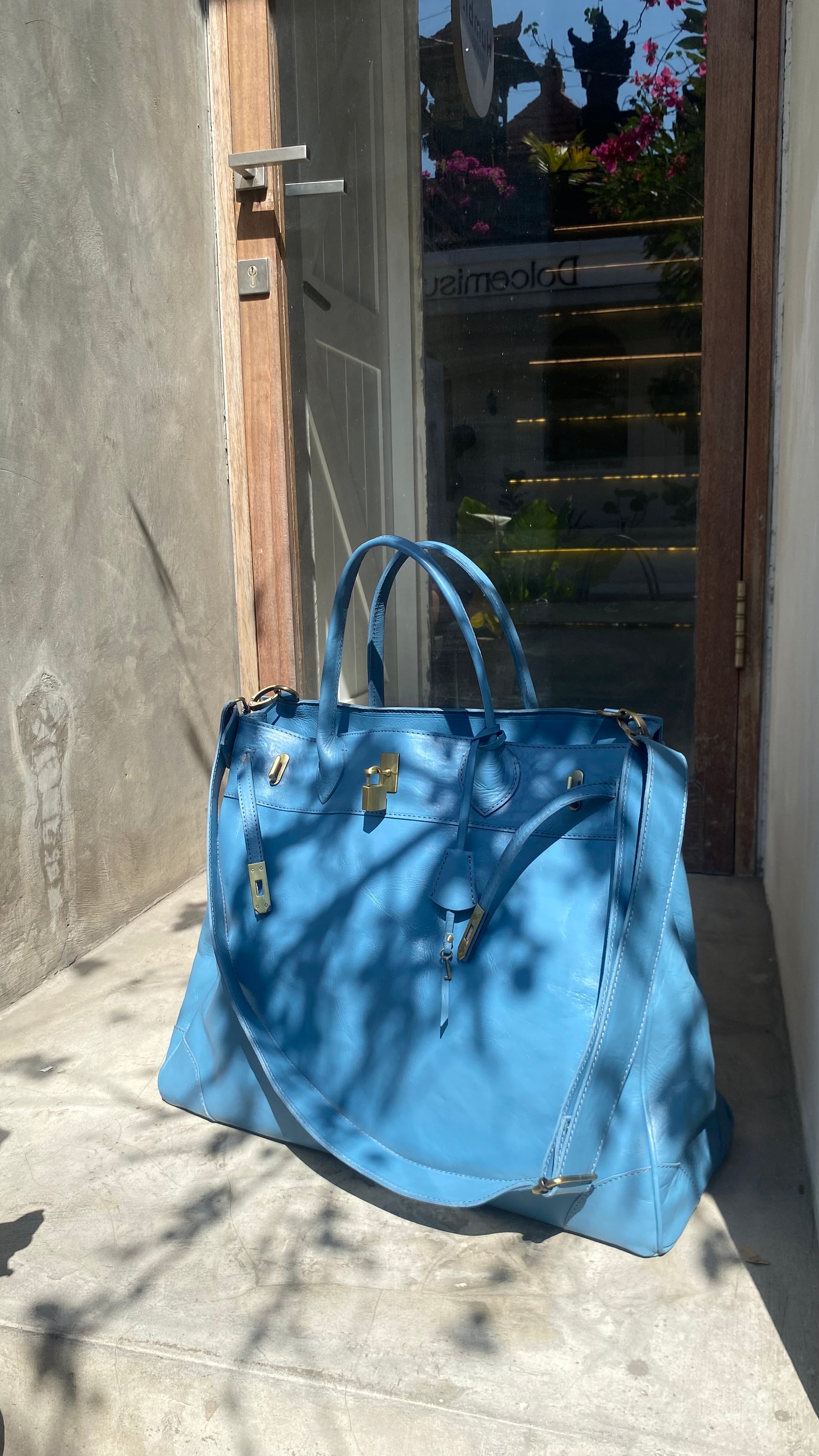 Blue full leather weekender strap